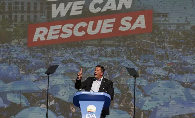 FILE - Main opposition Democratic Alliance (DA) party leader, John Steenhuisen, delivers his speech at a final election rally in Benoni, South Africa, on May 26, 2024. In a country where racial segregation was once brutally enforced, South Africa's new coalition government has brought a Black president and a white opposition leader together in what is on the face of it a picture of unity. (AP Photo/Themba Hadebe, File)