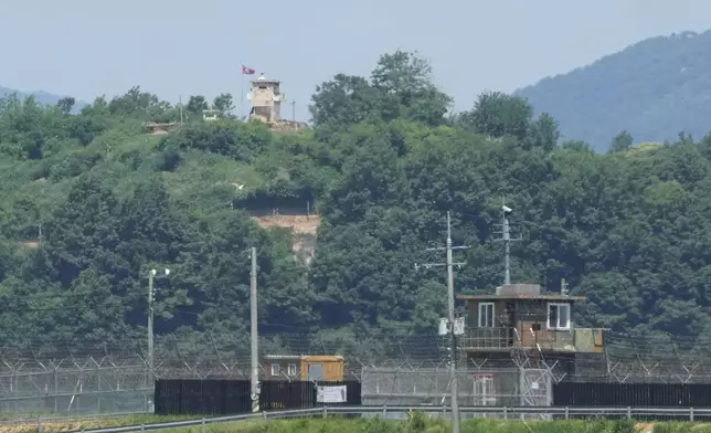 FILE - A North Korean military guard post, top, and South Korean post, bottom, are seen from Paju, South Korea, near the border with North Korea, on May 31, 2024. South Korea’s government has approved the suspension of a contentious military agreement with North Korea, a step that would allow it to take tougher responses to North Korean provocations. (AP Photo/Ahn Young-joon, File)
