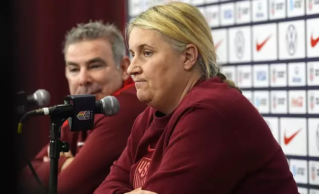 United States national women's soccer team head coach Emma Hayes, right, talks with reporters at a news conference before a practice to prepare for a friendly match against South Korea, Friday, May 31, 2024, in Commerce City, Colo. (AP Photo/David Zalubowski)