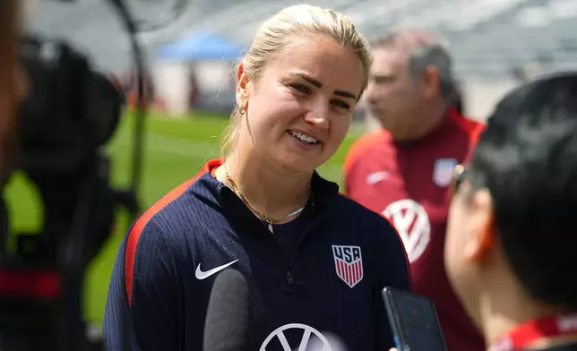 United States national women's soccer team player Lindsey Horan talks to reporters before a practice to prepare for a friendly match against South Korea, Friday, May 31, 2024, in Commerce City, Colo. (AP Photo/David Zalubowski)