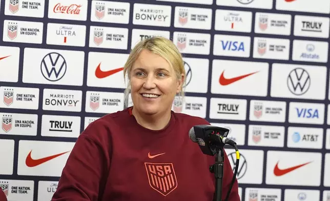 United States national women's soccer team head coach Emma Hayes jokes with reporters at a news conference before a practice to prepare for a friendly match against South Korea, Friday, May 31, 2024, in Commerce City, Colo. (AP Photo/David Zalubowski)