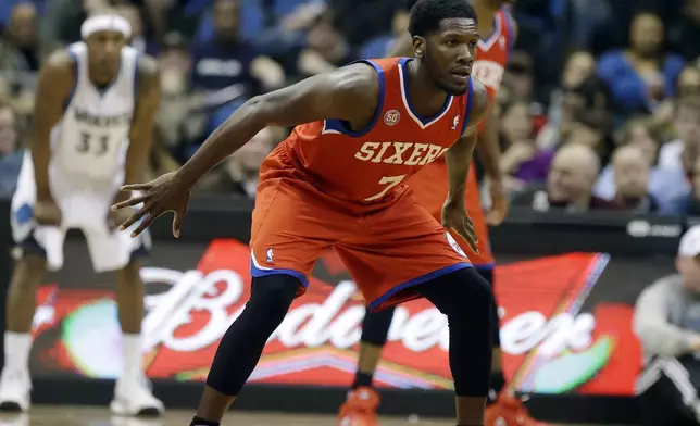 FILE - Philadelphia 76ers' Royal Ivey defends during the second half of teh team's NBA basketball game against the Minnesota Timberwolves, Feb. 20, 2013, in Minneapolis. Ivey is now the coach of the South Sudan men's basketball team, as well as an assistant coach with the Houston Rockets. (AP Photo/Jim Mone, File)