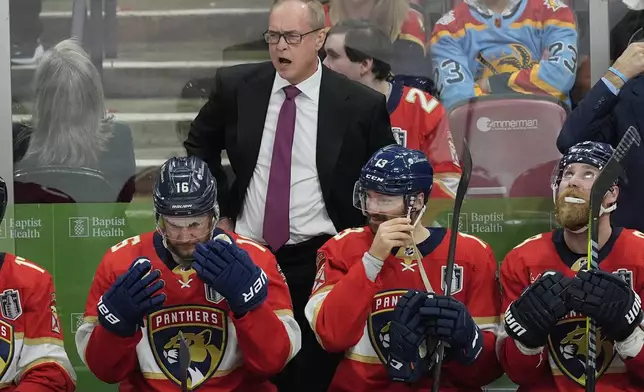 Florida Panthers head coach Paul Maurice gestures during the second period of Game 5 of the NHL hockey Stanley Cup Finals against the Edmonton Oilers, Tuesday, June 18, 2024, in Sunrise, Fla. (AP Photo/Rebecca Blackwell)