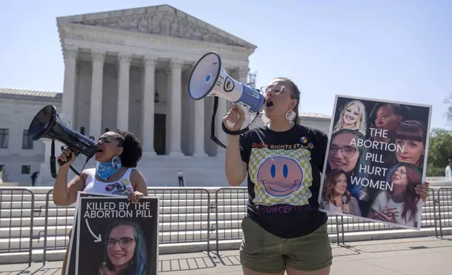 Anti-abortion protestors demonstrate outside the Supreme Court on Thursday, June 13, 2024, in Washington. The Supreme Court on Thursday unanimously preserved access to a medication that was used in nearly two-thirds of all abortions in the U.S. last year, in the court's first abortion decision since conservative justices overturned Roe v. Wade two years ago. (AP Photo/Mark Schiefelbein)