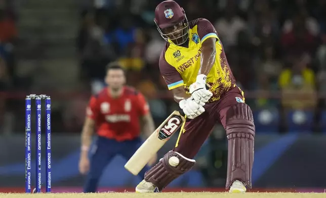 West Indies' Johnson Charles bats during the men's T20 World Cup cricket match between England and the West Indies at Darren Sammy National Cricket Stadium, Gros Islet, St Lucia, Wednesday, June 19, 2024. (AP Photo/Ramon Espinosa)