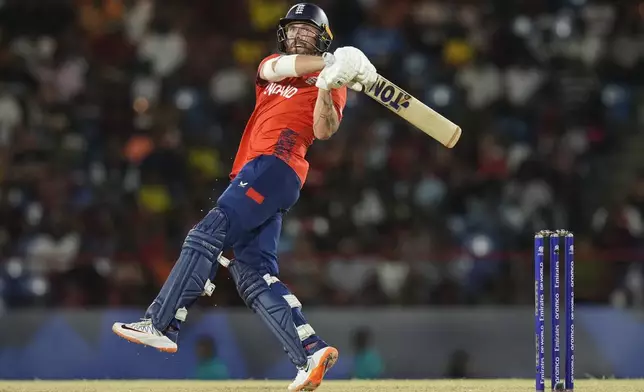 England's Phil Salt bats during the men's T20 World Cup cricket match between England and the West Indies at Darren Sammy National Cricket Stadium, Gros Islet, St Lucia, Wednesday, June 19, 2024. (AP Photo/Ramon Espinosa)