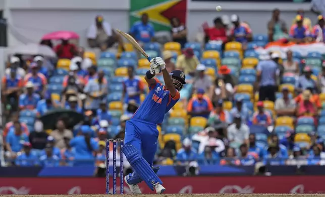 India's Axar Patel bats during the ICC Men's T20 World Cup final cricket match between India and South Africa at Kensington Oval in Bridgetown, Barbados, Saturday, June 29, 2024. (AP Photo/Ramon Espinosa)