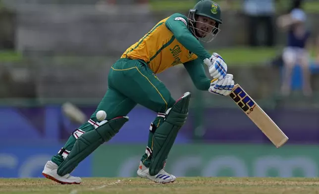 South Africa's Quinton de Kock plays a shot during the ICC Men's T20 World Cup cricket match between the United States and South Africa at Sir Vivian Richards Stadium in North Sound, Antigua and Barbuda, Wednesday, June 19, 2024. (AP Photo/Ricardo Mazalan)