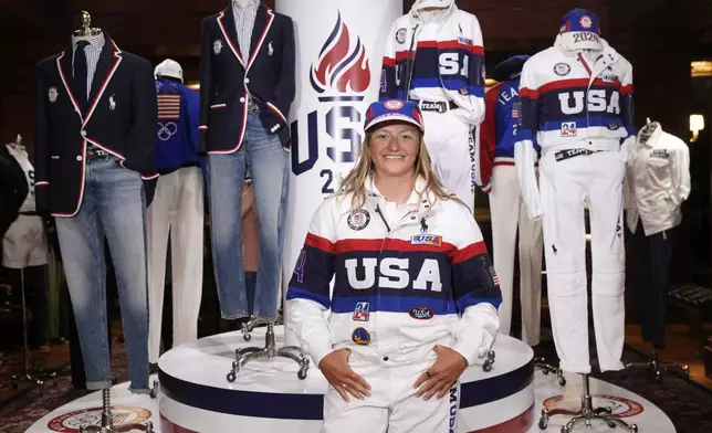 Olympic athlete in sailing, Daniela Moroz, models the Team USA Paris Olympics closing ceremony uniform at Ralph Lauren headquarters on Monday, June 17, 2024, in New York. (Photo by Charles Sykes/Invision/AP)
