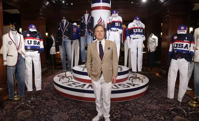 Chief Branding and Innovation Officer David Lauren unveils the Team USA Paris Olympics opening and closing ceremony uniforms at Ralph Lauren headquarters on Monday, June 17, 2024, in New York. (Photo by Charles Sykes/Invision/AP)