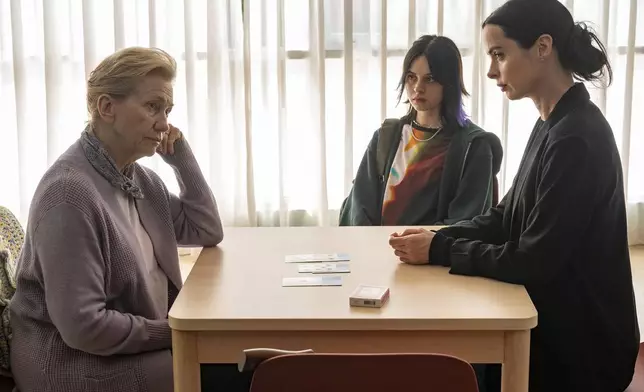 This image released by AMC+ shows Kathy Baker, from left, Amanda Fix and Krysten Ritter in a scene from "Orphan Black: Echoes." (Sophie Giraud/AMC via AP)