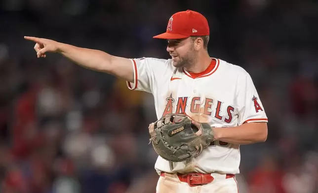 Los Angeles Angels first baseman Nolan Schanuel gestures after the team's win in a baseball game against the Detroit Tigers, Thursday, June 27, 2024, in Anaheim, Calif. (AP Photo/Ryan Sun)