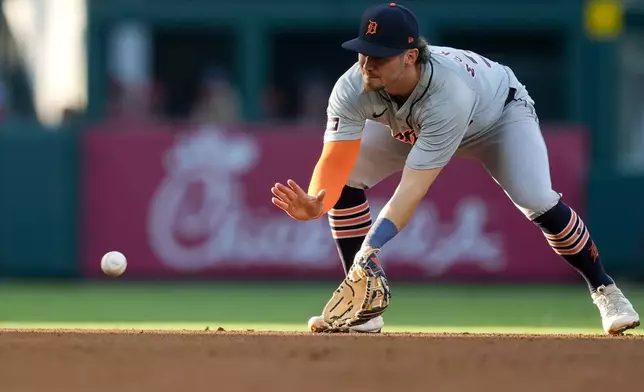 Detroit Tigers shortstop Zach McKinstry fields a ground ball hit by Los Angeles Angels' Luis Rengifo, who was out at first during the third inning of a baseball game, Thursday, June 27, 2024, in Anaheim, Calif. (AP Photo/Ryan Sun)