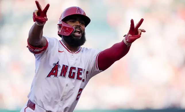 Los Angeles Angels' Luis Rengifo gestures while running the bases on a two-run home run against the Detroit Tigers during the first inning of a baseball game Friday, June 28, 2024, in Anaheim, Calif. (AP Photo/Ryan Sun)