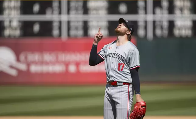 Minnesota Twins pitcher Bailey Ober celebrates after throwing a complete game for a win following a baseball game against the Oakland Athletics in Oakland, Calif,. Saturday, June 22, 2024. (AP Photo/Nic Coury)