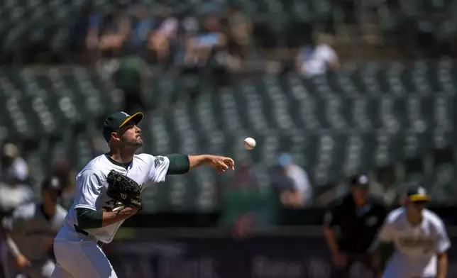 Oakland Athletics pitcher JP Sears throws during the seventh inning of a baseball game against the Minnesota Twins in Oakland, Calif,. Saturday, June 22, 2024. (AP Photo/Nic Coury)