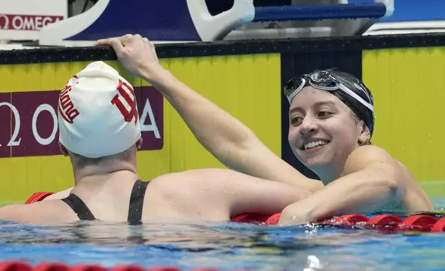 Kate Douglass and Lilly King celebrate after the Women's 200 breaststroke finals Thursday, June 20, 2024, at the US Swimming Olympic Trials in Indianapolis. (AP Photo/Darron Cummings)