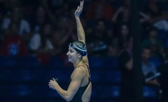 Kate Douglass waves after the Women's 200 breaststroke finals Thursday, June 20, 2024, at the US Swimming Olympic Trials in Indianapolis. (AP Photo/Darron Cummings)