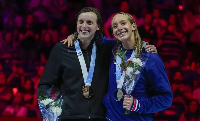 Katie Ledecky and Paige Madden celebrate after the Women's 800 freestyle finals Saturday, June 22, 2024, at the US Swimming Olympic Trials in Indianapolis. (AP Photo/Michael Conroy)