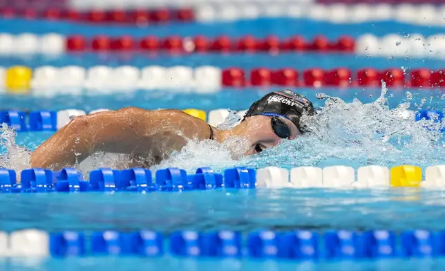 Katie Ledecky swims during the Women's 1500 freestyle finals Wednesday, June 19, 2024, at the US Swimming Olympic Trials in Indianapolis. (AP Photo/Michael Conroy)