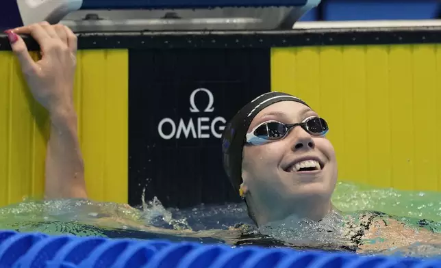 Gretchen Walsh smiles after a Women's 50 freestyle semifinals heat Saturday, June 22, 2024, at the US Swimming Olympic Trials in Indianapolis. (AP Photo/Michael Conroy)