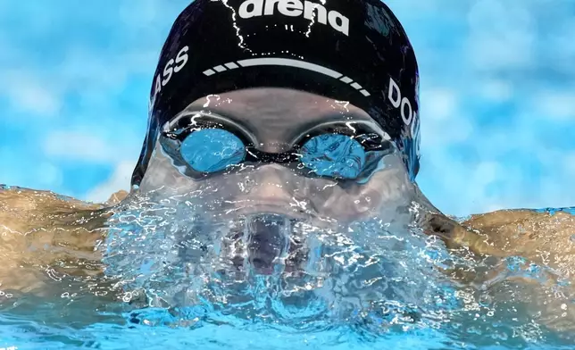 Kate Douglass swins during the Women's 200 individual medley finals Saturday, June 22, 2024, at the US Swimming Olympic Trials in Indianapolis. (AP Photo/Michael Conroy)