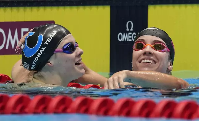 Regan Smith and Alex Shackell after the Women's 200 butterfly finals Thursday, June 20, 2024, at the US Swimming Olympic Trials in Indianapolis. (AP Photo/Darron Cummings)