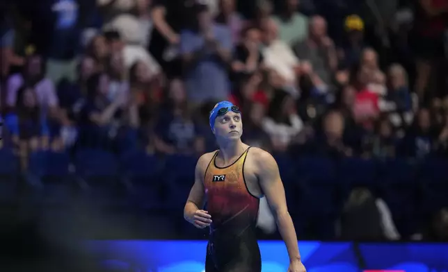 Katie Ledecky looks up after the Women's 1500 freestyle finals Wednesday, June 19, 2024, at the US Swimming Olympic Trials in Indianapolis. (AP Photo/Michael Conroy)