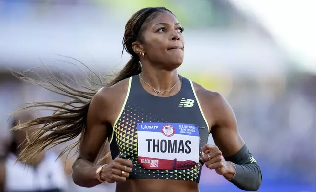 Gabby Thomas wins a heat women's 200-meter semi-finals during the U.S. Track and Field Olympic Team Trials Friday, June 28, 2024, in Eugene, Ore. (AP Photo/George Walker IV)