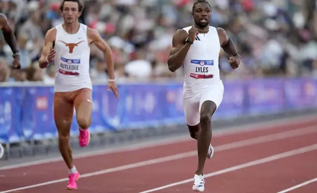 Noah Lyles wins a heat in the men's 200-meter run during the U.S. Track and Field Olympic Team Trials Thursday, June 27, 2024, in Eugene, Ore. (AP Photo/Charlie Neibergall)
