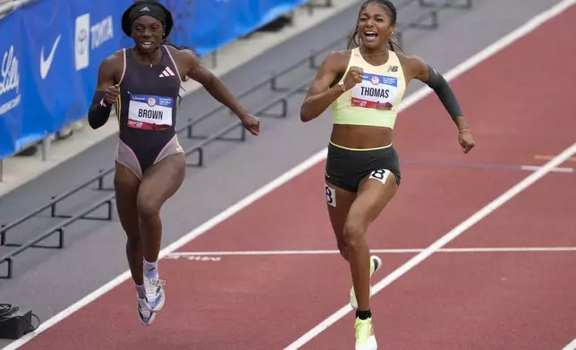 Gabby Thomas celebrates after winning the women's 200-meter final during the U.S. Track and Field Olympic Team Trials Saturday, June 29, 2024, in Eugene, Ore. (AP Photo/Chris Carlson)