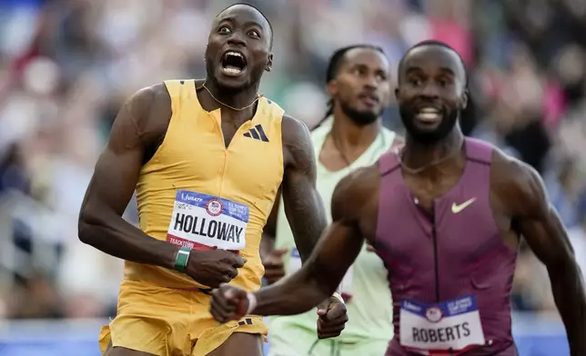 Grant Holloway wins the men's 110-meter hurdles final during the U.S. Track and Field Olympic Team Trials Friday, June 28, 2024, in Eugene, Ore. (AP Photo/Charlie Neibergall)