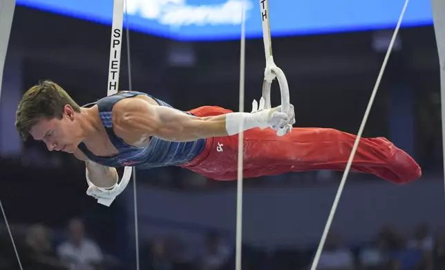 Brody Malone competes on the still rings at the United States Gymnastics Olympic Trials on Thursday, June 27, 2024, in Minneapolis. (AP Photo/Abbie Parr)