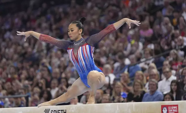Suni Lee competes on the balance beam at the United States Gymnastics Olympic Trials on Friday, June 28, 2024, in Minneapolis. (AP Photo/Abbie Parr)