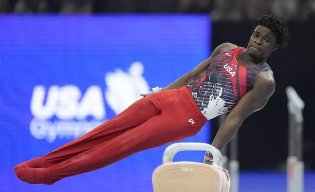 Frederick Richard competes on the pommel horse at the United States Gymnastics Olympic Trials on Saturday, June 29, 2024, in Minneapolis. (AP Photo/Charlie Riedel)