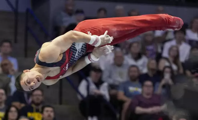 Paul Juda competes on the horizontal bar at the United States Gymnastics Olympic Trials on Saturday, June 29, 2024, in Minneapolis. (AP Photo/Charlie Riedel)