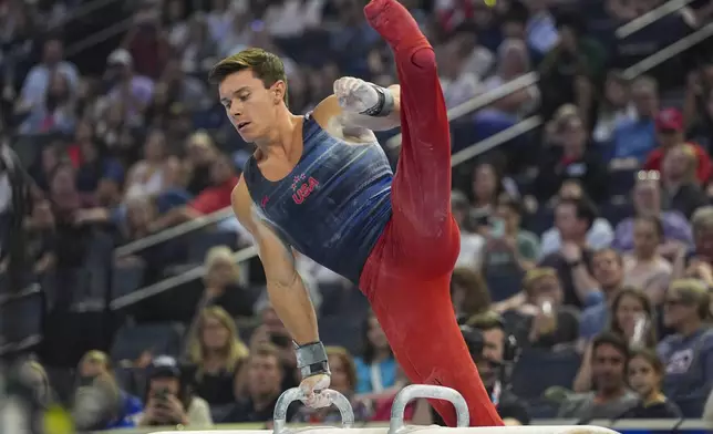 Brody Malone competes on the pommel horse at the United States Gymnastics Olympic Trials on Thursday, June 27, 2024, in Minneapolis. (AP Photo/Abbie Parr)