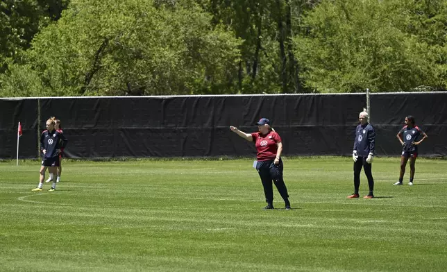 New coach Emma Hayes, center, leads the U.S. women's soccer team in practice Tuesday, May 28, 2024, in Boulder, Colo. (RJ Sangosti/The Denver Post via AP)