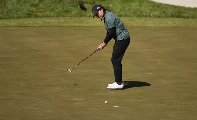 Wichanee Meechai, of Thailand, putts on the 12th green during the third round of the U.S. Women's Open golf tournament at Lancaster Country Club, Saturday, June 1, 2024, in Lancaster, Pa. (AP Photo/Matt Slocum)