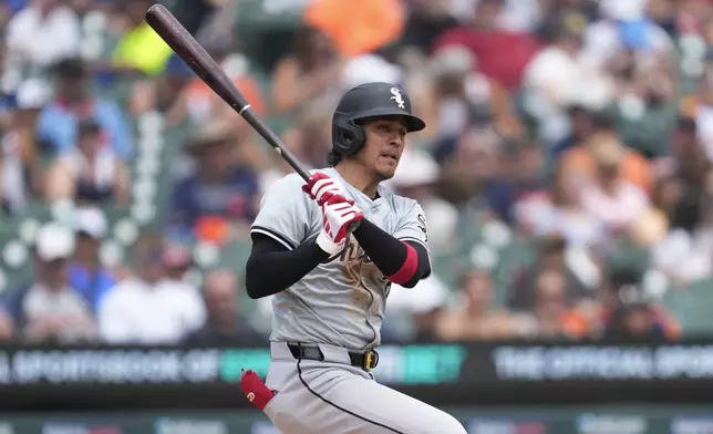 Chicago White Sox's Nicky Lopez hits a one-run double against the Detroit Tigers in the fourth inning of a baseball game, Saturday, June 22, 2024, in Detroit. (AP Photo/Paul Sancya)
