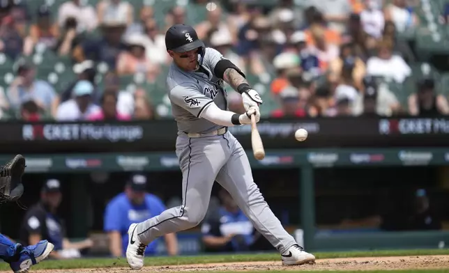 Chicago White Sox's Korey Lee hits a home run against the Detroit Tigers in the sixth inning of a baseball game, Saturday, June 22, 2024, in Detroit. (AP Photo/Paul Sancya)