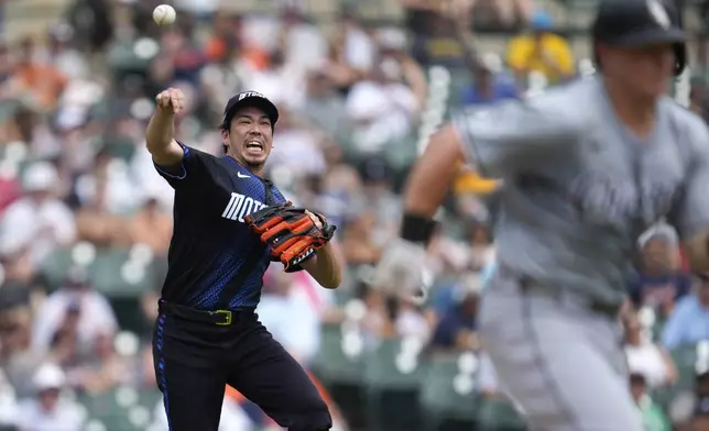 Detroit Tigers pitcher Kenta Maeda throws Chicago White Sox's Andrew Vaughn out at first base in the fourth inning of a baseball game, Saturday, June 22, 2024, in Detroit. (AP Photo/Paul Sancya)