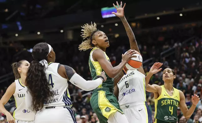 Seattle Storm's Jordan Horston gets the defensive board and puts the shot back up against the Dallas Wings during a WNBA basketball game Saturday, June 29, 2024, in Seattle. (Dean Rutz/The Seattle Times via AP)