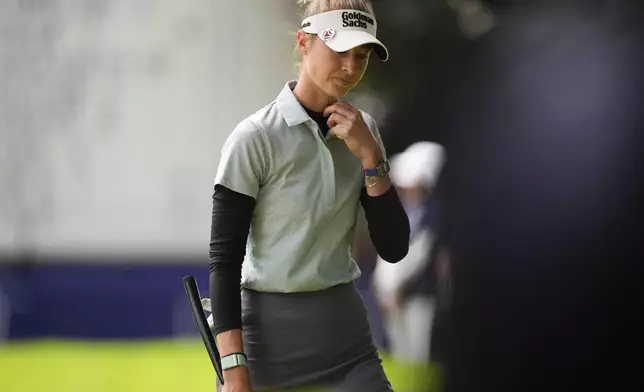 Nelly Korda walks off the green after completing the sixth hole during the second round of the Women's PGA Championship golf tournament at Sahalee Country Club, Friday, June 21, 2024, in Sammamish, Wash. (AP Photo/Gerald Herbert)