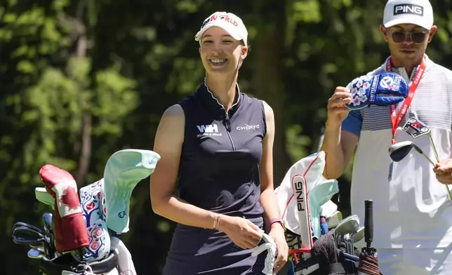 Alexandra Forsterling, of Germany, smiles on the fourth green during a practice round for the Womens PGA Championship golf tournament at Sahalee Country Club, Wednesday, June 19, 2024, in Sammamish, Wash. (AP Photo/Gerald Herbert)