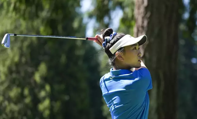 Lucy Li hits off the ninth tee during a practice round for the Womens PGA Championship golf tournament at Sahalee Country Club, Wednesday, June 19, 2024, in Sammamish, Wash. (AP Photo/Gerald Herbert)