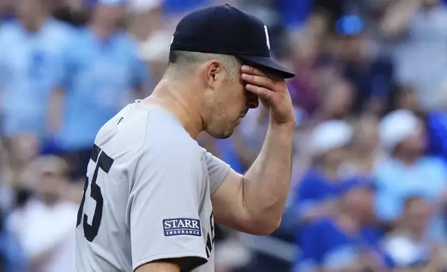 New York Yankees pitcher Carlos Rodon reacts after giving up a three-run home run to Toronto Blue Jays' George Springer during the second inning of a baseball game Thursday, June 27, 2024, in Toronto. (Frank Gunn/The Canadian Press via AP)