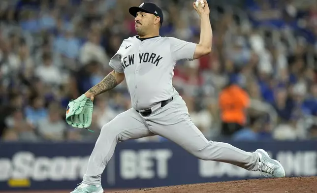 New York Yankees pitcher Nestor Cortes (65) works against the Toronto Blue Jays during the first inning of a baseball game in Toronto, Saturday, June 29, 2024. (Frank Gunn/The Canadian Press via AP)