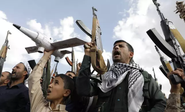 Houthi supporters attend anti-Israel and anti-U.S. protests in Sanaa, Yemen, Friday, June 14, 2024. (AP Photo/Osamah Abdulrahman)