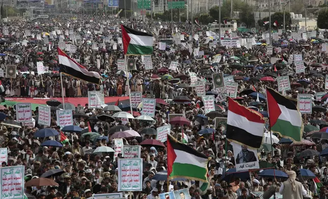 Houthi supporters attend anti-Israel and anti-U.S. protests in Sanaa, Yemen, Friday, June 14, 2024. (AP Photo/Osamah Abdulrahman)